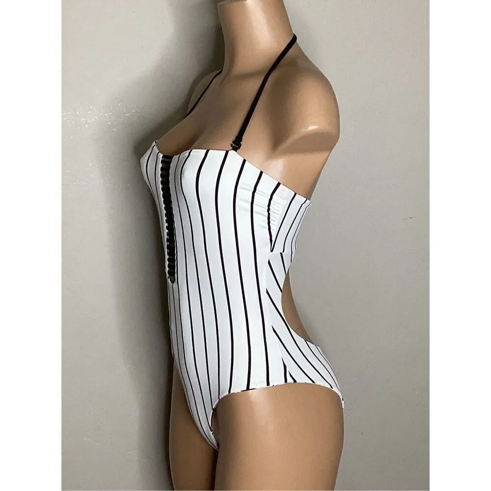 New. WET watercolor floral reversible swimsuit. X-Small. Retails $208